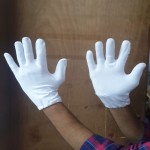 white cotton gloves
